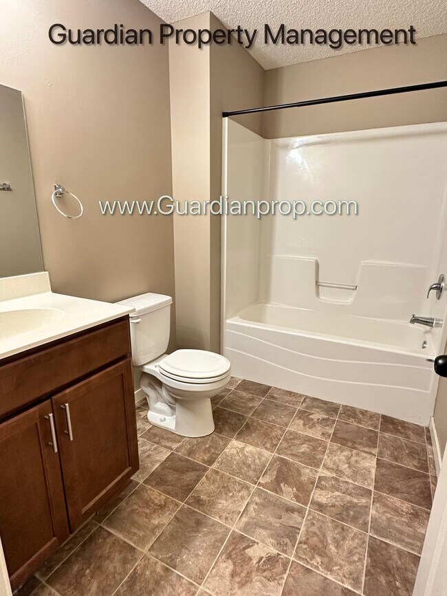Building Photo - Champlin Town Home, 2 Car Garage, Dishwasher, Washer/Dryer, Balcony, July/Aug 1st Move In