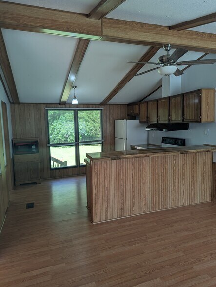 Main Room view into Kitchen - 12619 Wildlife Ln