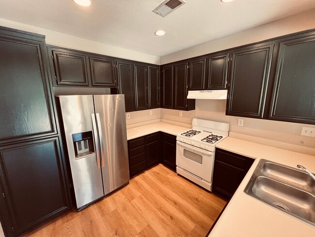 Building Photo - Recently Reduced Price- Chula Vista 3 Bedroom 2.5 bath townhome style corner unit