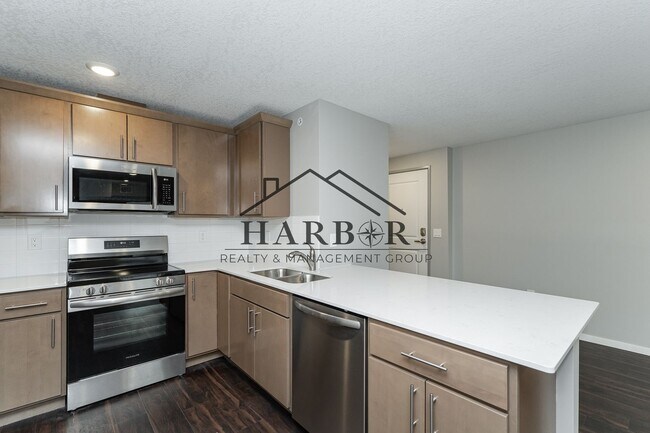 Building Photo - Brand NEW Caroline Apartments 201 -  Move ...