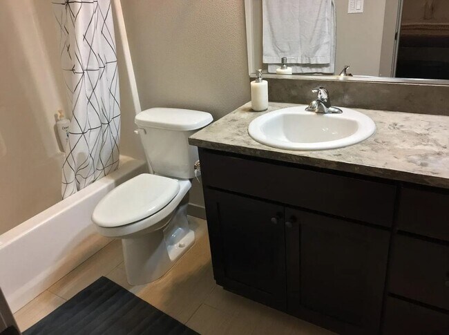 Building Photo - Arbor Lodge Neighborhood Townhome with Central A/C, Garage, In-Unit Laundry, Fenced Backyard