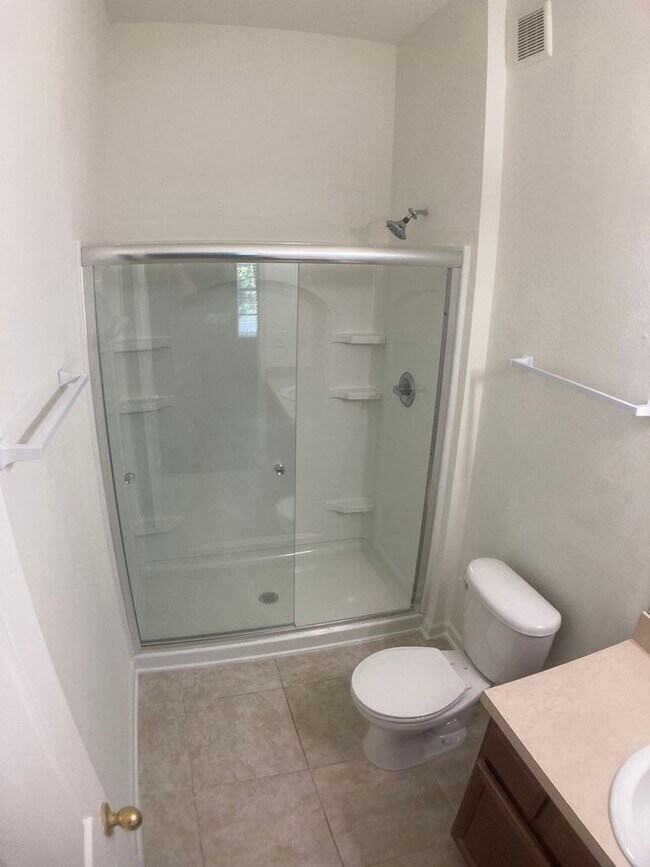 Building Photo - Spacious 3-Bedroom Condo with Pond Views &...