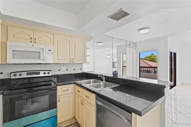 Building Photo - 10877 NW 7th St