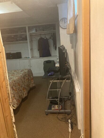 Entry into Bdrm, radiator,clothing unit - 764 Lenore Ln