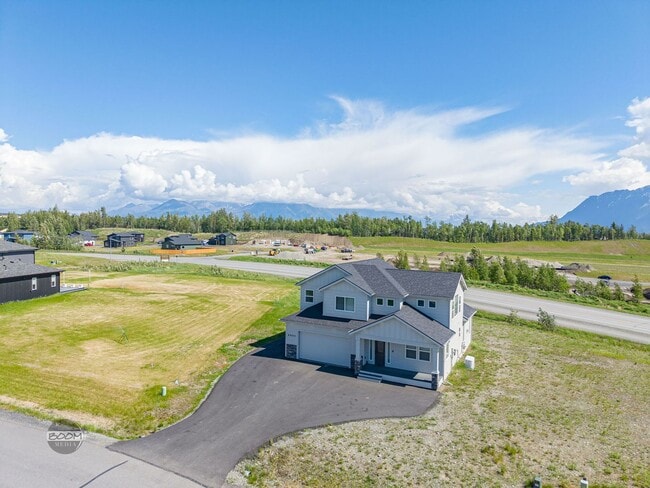 Building Photo - Premium 4BR Rental in The Ranch | Stunning Mountain Views | Easy Community Location | Automatic G...
