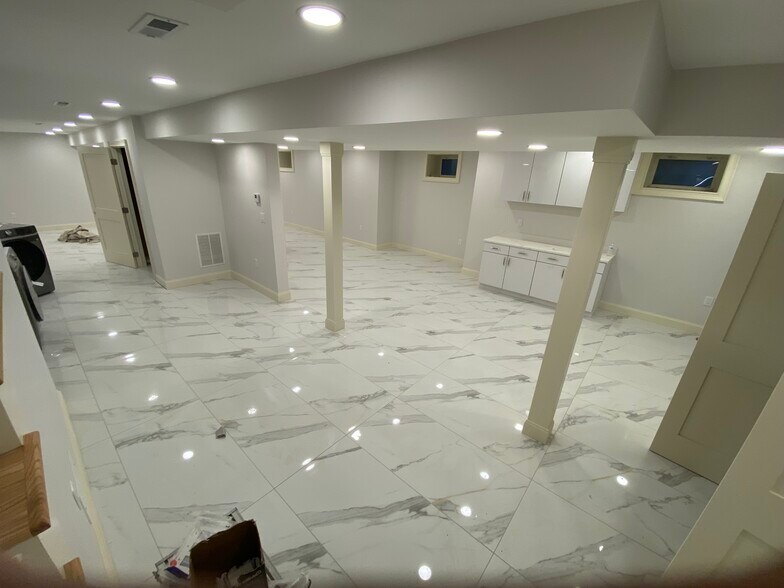 Shared basement space for storage or activity - 583 Highland Ave