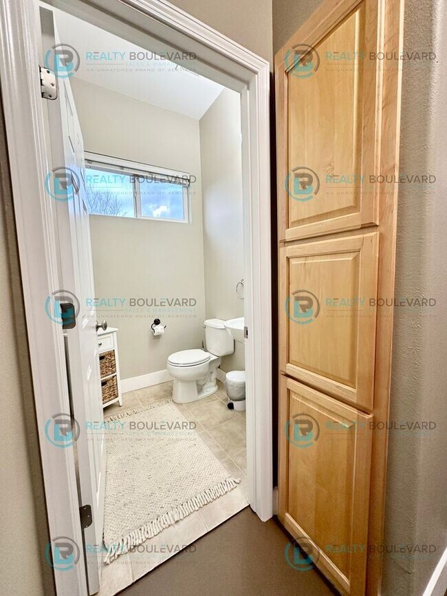 Building Photo - Open Kitchen, Expansive Living, and Covered Patio in Tranquil South Reno Near Trails, Parks & Sho...