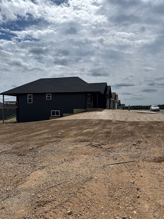 Building Photo - NEW 5 Bed 3 Bath w/ Walk Out Basement Waynesville School District