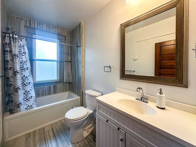 Building Photo - A home where old-world charm meets modern sophistication!
