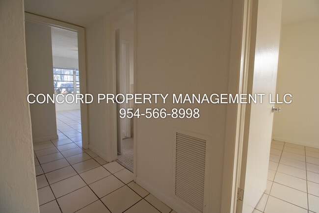 Building Photo - Spacious 2 Bedroom, 1 Bathroom- Pool - Laundry on Site- Fully Tiled- Central AC