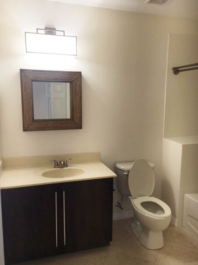 Building Photo - 3 Bedroom 2 Bath corner unit with wrap around balcony in Elevator Building in East Village of Cel...