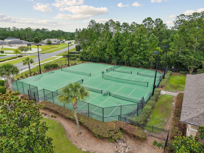 Building Photo - Modern 4BR Home with 3 Full Baths in River Glen | Screened Porch & Resort-Style Amenities