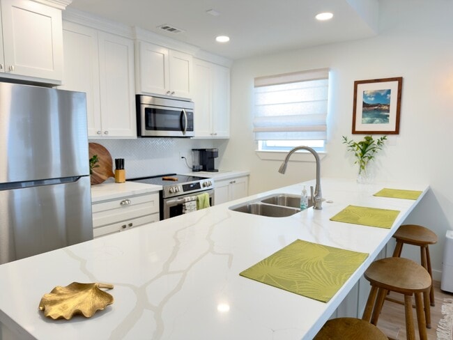 Building Photo - 6410 Padre Blvd