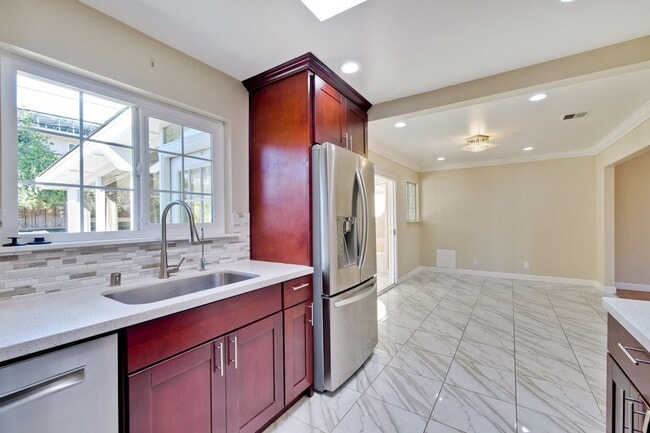 Building Photo - Turnkey Home with Natural Light & Upgrades...