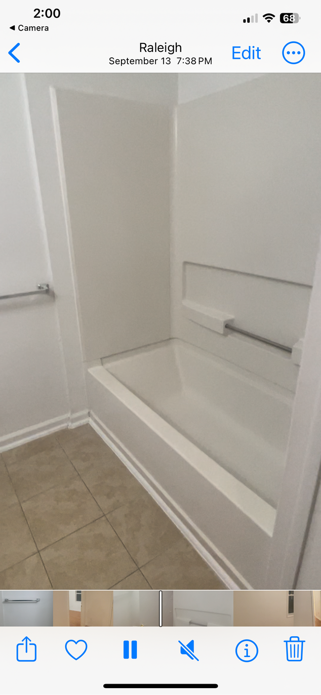 Bathtub and shower in bedroom - 1120 Carlton Ave