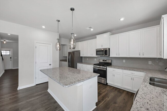 Building Photo - Sophisticated Like-New 4-Bedroom Home with Designer Finishes & Fenced Backyard!