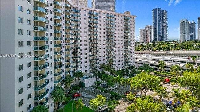 Building Photo - 19380 Collins Ave