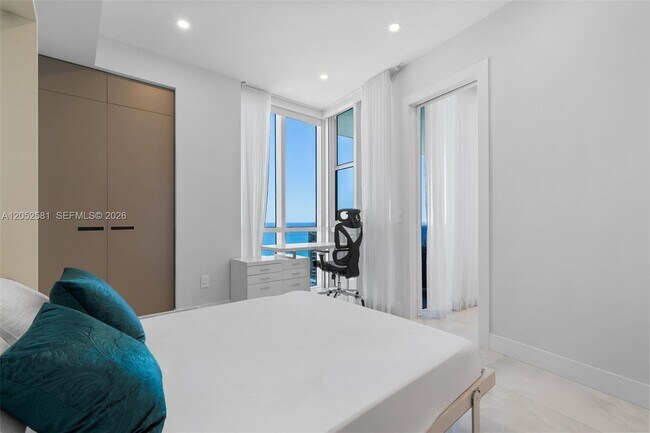 Building Photo - 18201 Collins Ave