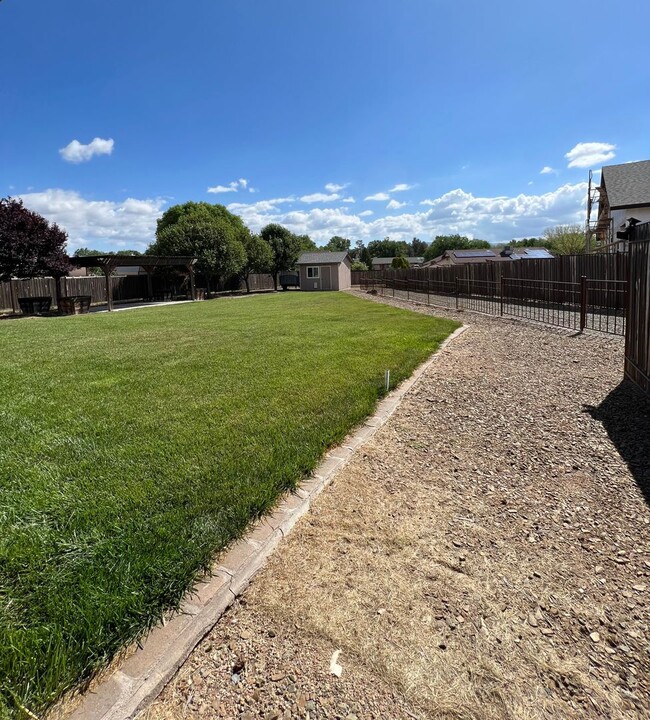 Building Photo - Three Bedroom, Two Bath home with RV Parking!