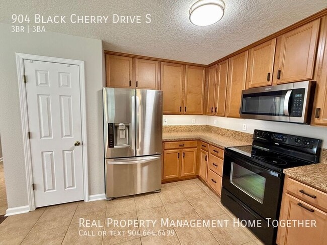 Building Photo - 904 Black Cherry Dr S