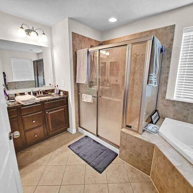Building Photo - Stately End Unit 3-Level Townhome, 3 Bedro...