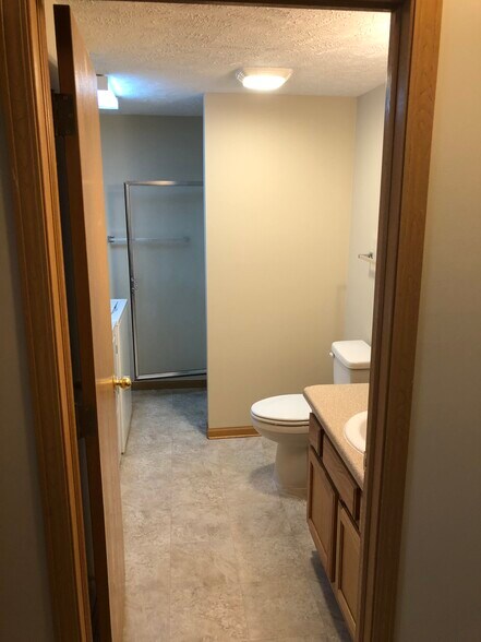 bathroom laundry with shower - 5830 Princess Margaret Dr