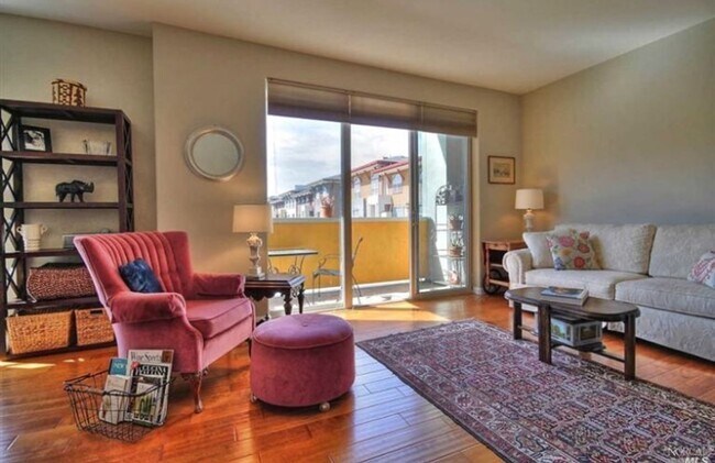 Building Photo - Modern 2BR/2.5BA Condo with Ensuite Bathro...
