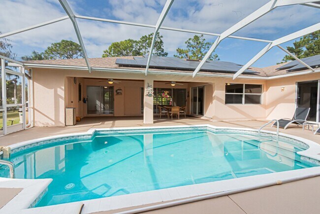 Building Photo - 5-Bed Home With Private Heated Pool & Large Yard - Pet Friendly!