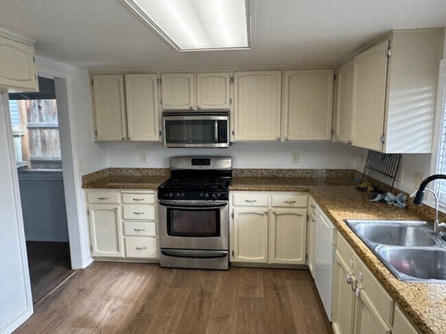 Building Photo - COMING SOON!!  REMODELED 3 BEDROOM HOME / LARGE FENCED YARD