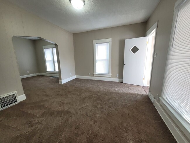 Building Photo - Two bedroom home with partially fenced yard!