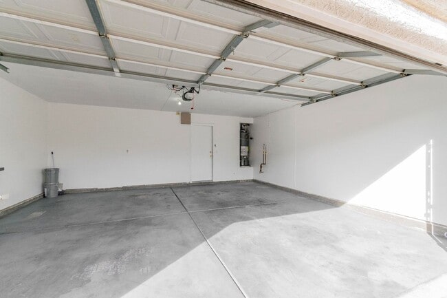 Building Photo - Upgraded 4BR Henderson Home | New Floors | Gated Community | 2-Car Garage