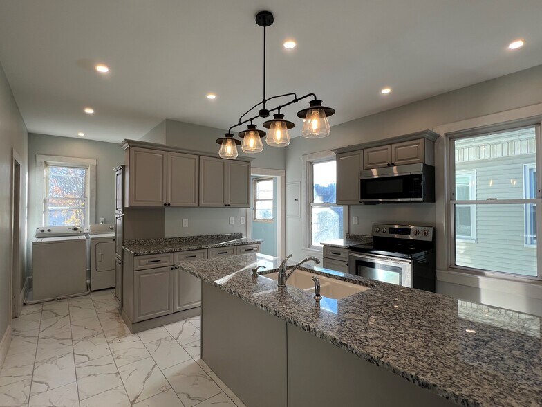 New kitchen with in-unit laundry - 56 State St