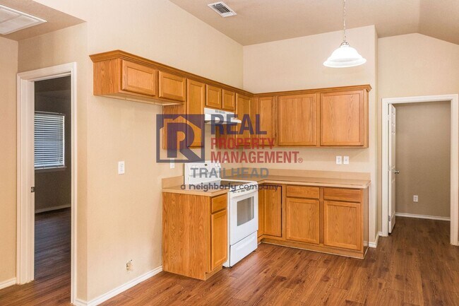 Building Photo - Well-Maintained Home with Large Yard and Storage Shed