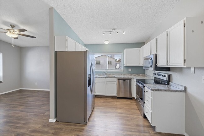 Building Photo - Spacious 4-Bedroom Home with Finished Basement, Large Deck & 2-Car Garage