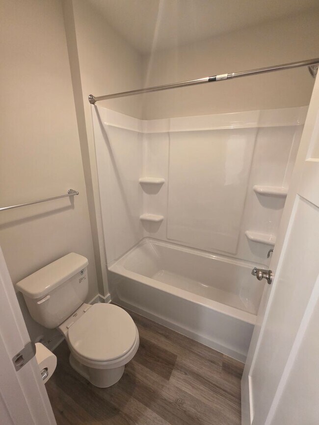 Building Photo - Luxury 4-Bedroom Townhome with Finished Walkout Basement & River Views