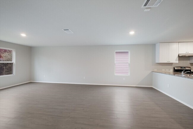 Building Photo - Open-Concept Living with New Flooring