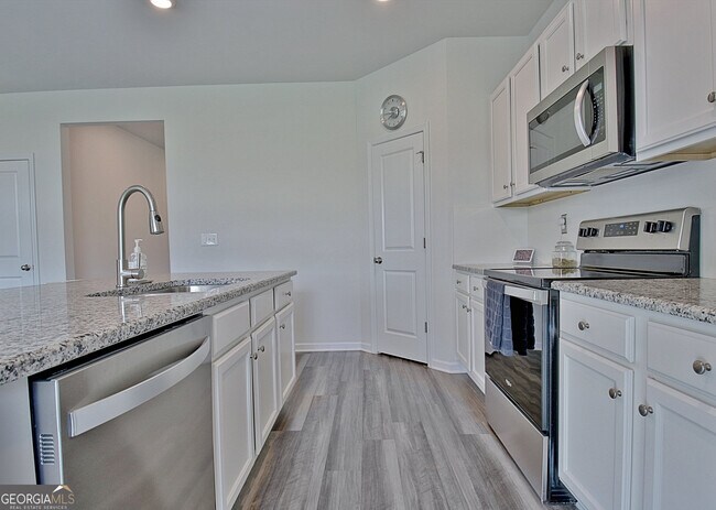 Building Photo - 8077 Rudder Cir