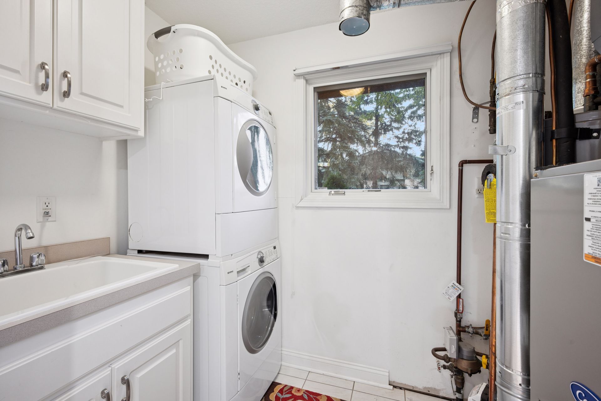 Laundry is located just off the kitchen - 145 Holly Ln N