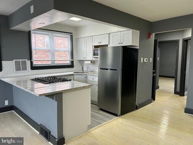 Building Photo - 8305-7 Michener Ave