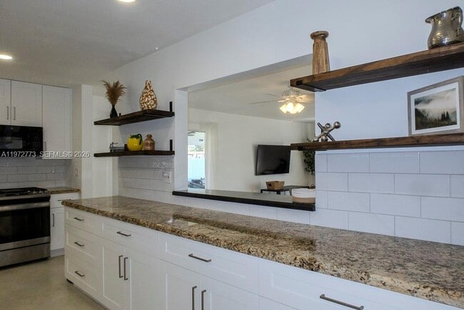 Building Photo - 9731 Bel Aire Dr