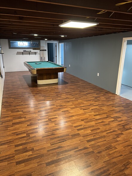 Basement w/pool table - 110 W Elmer St