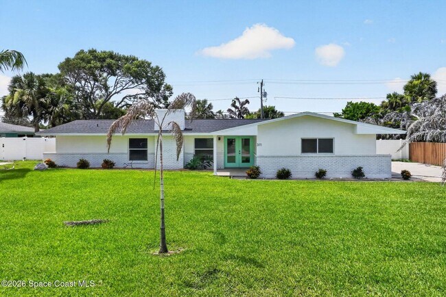 Building Photo - Welcome to this beautifully remodeled 4-bedroom, 3-bath home in the heart of Indialantic Beach!