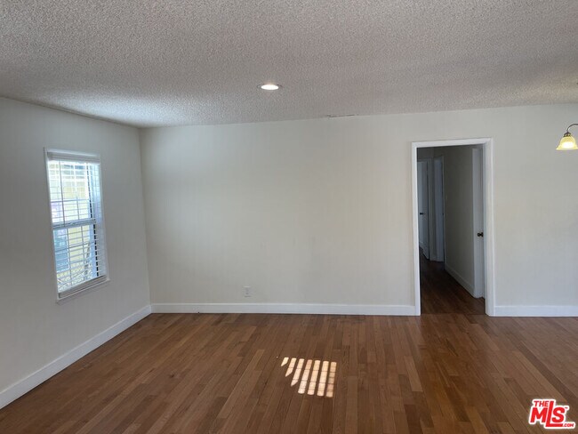 Building Photo - 10631 Tinker Ave