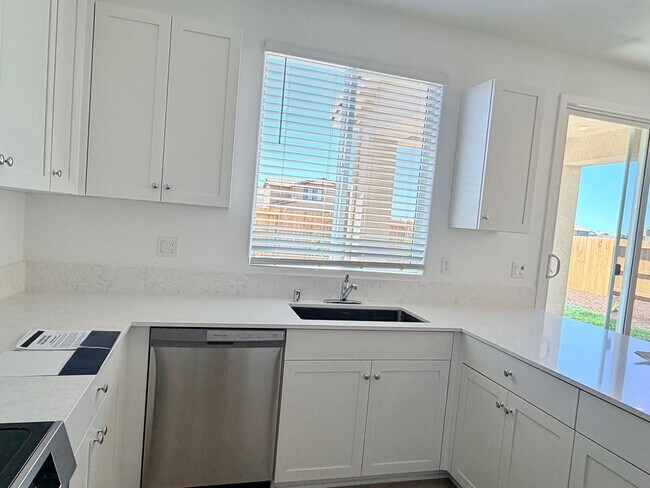 Building Photo - **Welcome to this beautifully designed 4-bedroom, 3-bathroom home offering modern living space.**