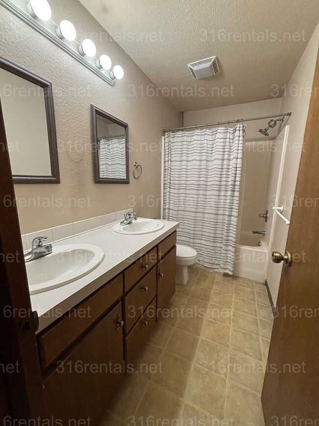Building Photo - Three bed two bath house available now!