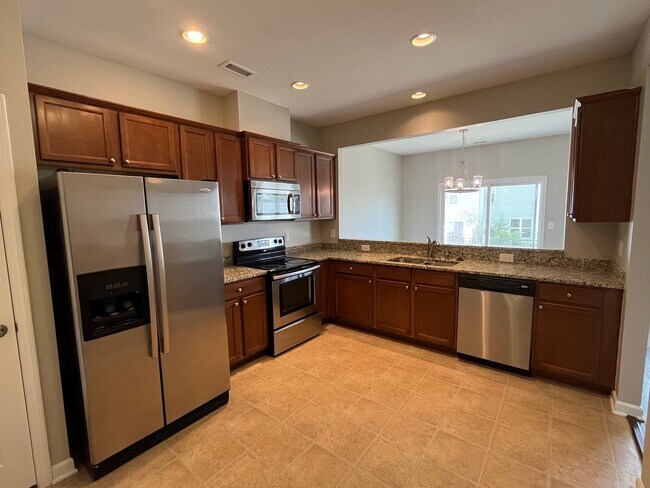 Building Photo - **OFFERING REFUNDABLE APPLICATION FEES** Fantastic 3BD, 2.5BA North Raleigh Townhome with Fenced ...