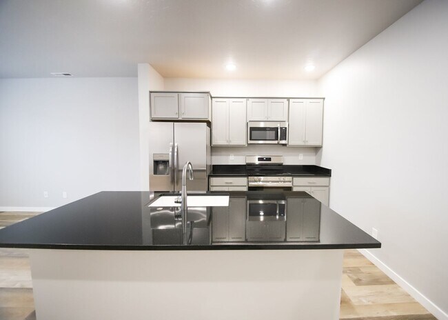 Building Photo - Baraya Townhomes: Modern Townhomes for Ren...