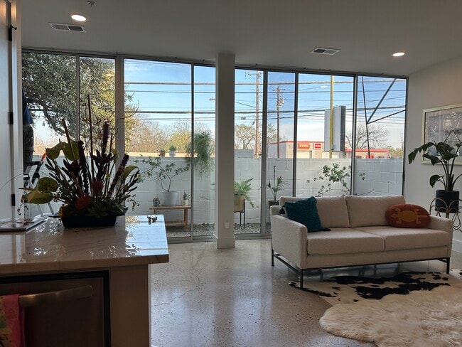 Floor to ceiling automated light filtering blinds - 2906 S 1st St