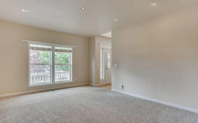 Building Photo - Spacious Four-Bedroom Home with Gourmet Kitchen, Multiple Living Areas, Loft, and Beautifully Lan...
