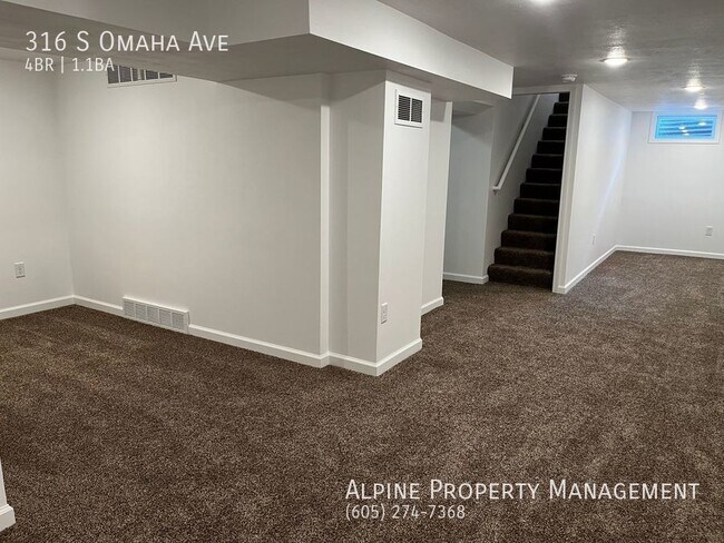 Building Photo - 4 Bed/1.5 Bath with Triple Stall Garage!